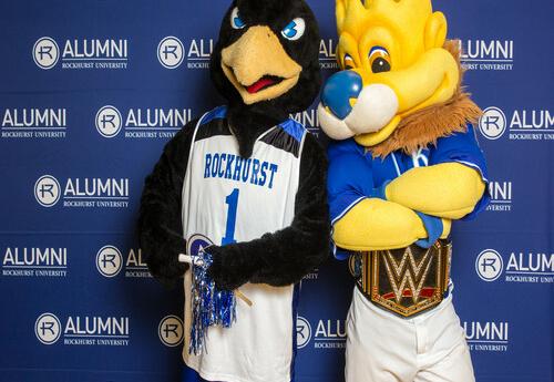 Rockhurst's Rock E. Hawk and Royals' Slugger side-by-side in a photo booth
